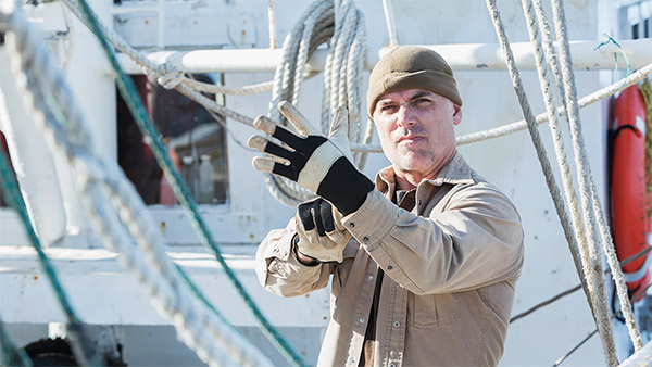 A seaman who is working on a ship